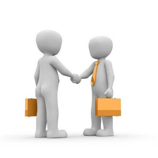 impression of an investment property agent and a seller agent shaking hands over a deal