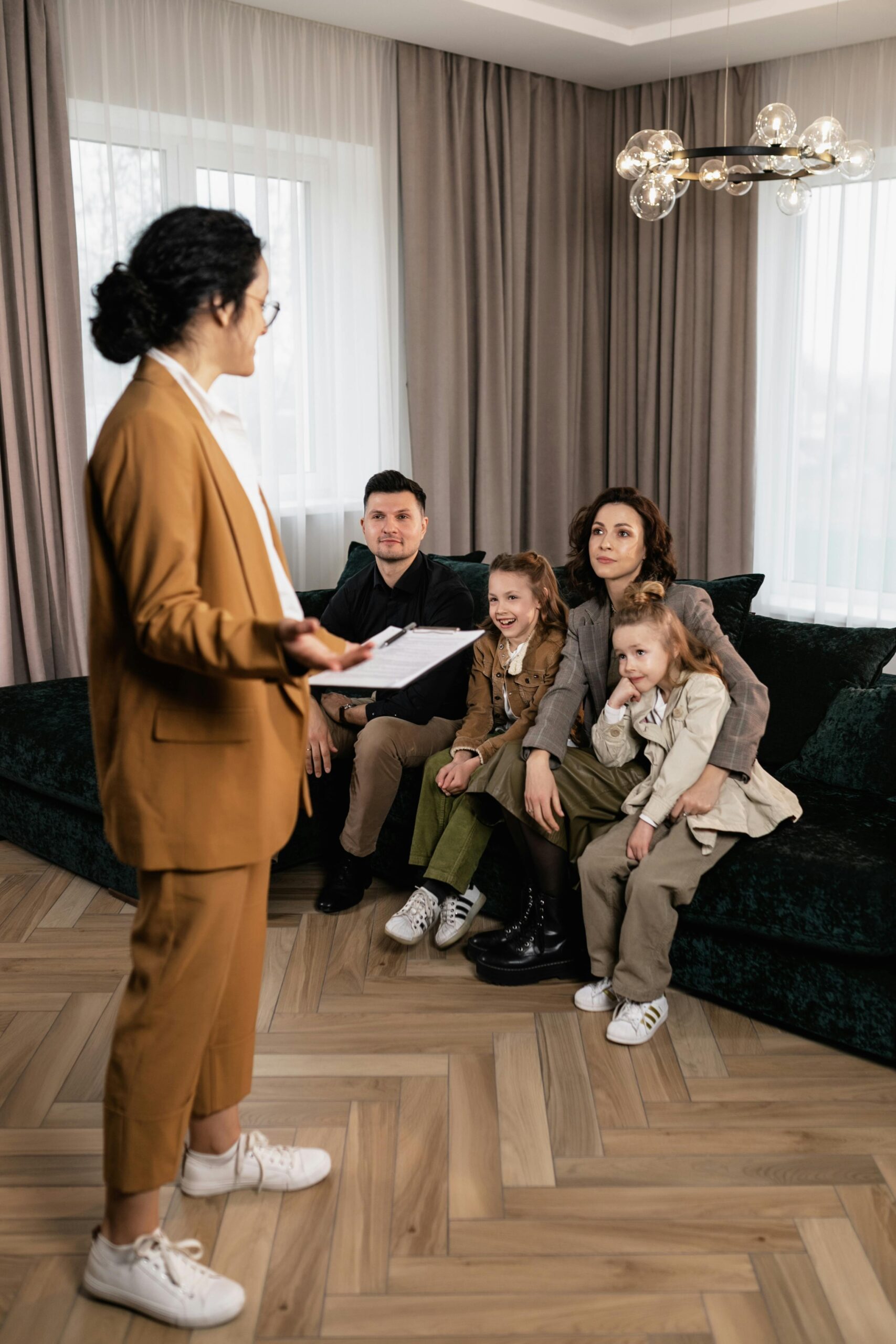 an image of a family helped by a real estate agent in buying a property