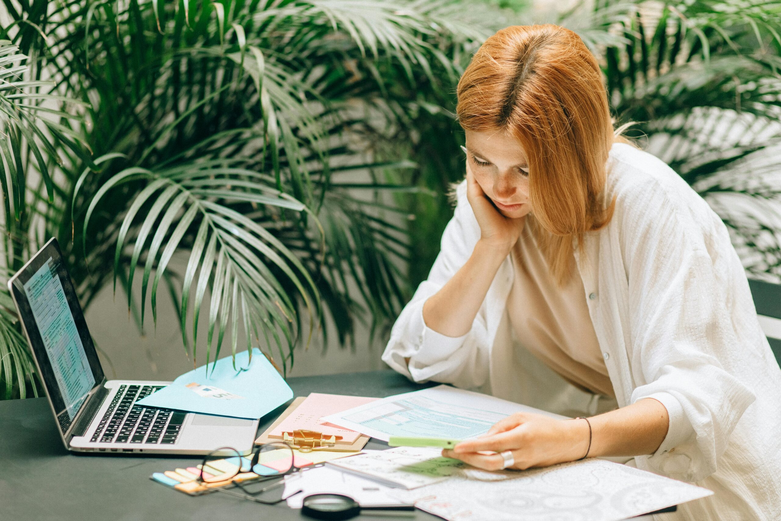 a women reviewing strata documents